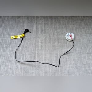 Black and White Try Me Button with Yellow Tag